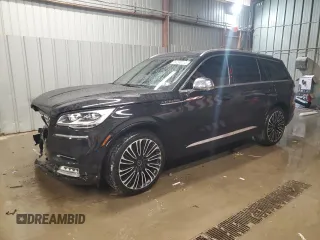 2020 Lincoln Aviator Black Label with VIN 5LM5J9XC6LGL01352, listed as a Copart auction lot 84290214 with 71,182 mi miles and Salvage title. Bid and sale history available at DreamBid. Image 1.