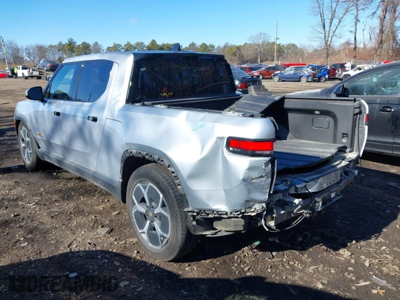 2022 Rivian R1T Adventure Package with VIN 7FCTGAAA1NN012328, listed as a IAAI auction lot 41307929 with 13,588 mi miles. Bid and sale history available at carsss.com. Image 3.
