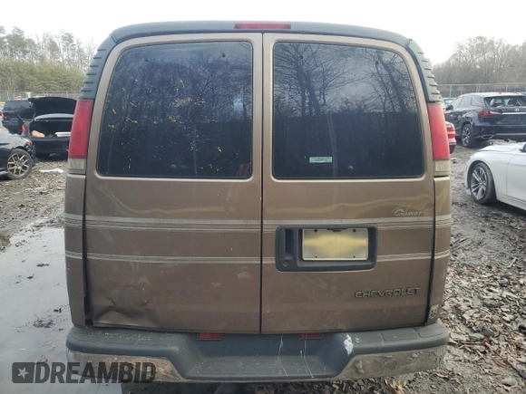 1996 Chevrolet Chevy Van z VIN 1GBFG15M1T1001653, wystawiony jako Copart lot #84589274 z przebiegiem Nie podano mil oraz Nie do naprawy • Non repairable. Historia ofert i sprzedaży dostępna na DreamBid. Obrazek 6.