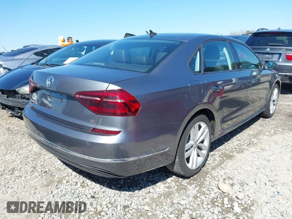 2019 Volkswagen Passat 2.0T Wolfsburg Edition with VIN 1VWLA7A38KC003562, listed as a IAAI auction lot 41704839 with 67,313 mi miles. Bid and sale history available at carsss.com. Image 4.