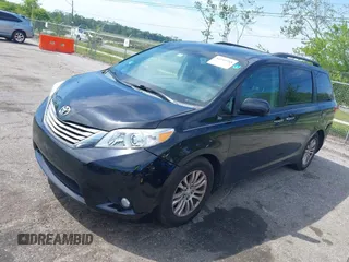 2015 Toyota Sienna XLE with VIN 5TDYK3DC9FS566344, listed as a IAAI auction lot 42049288 with 154,337 mi miles. Bid and sale history available at carsss.com. Image 2.