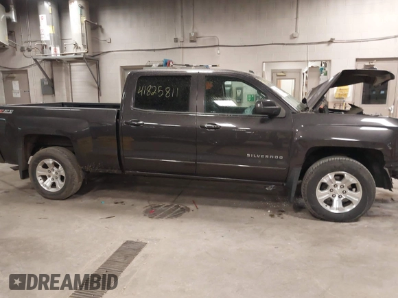 2016 Chevrolet Silverado 1500 LT with VIN 3GCUKRECXGG216804, listed as a IAAI auction lot 41825811 with 127,217 mi miles and . Bid and sale history available at DreamBid. Image 13.