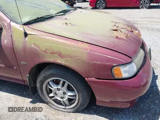 1999 Nissan Sentra XE with VIN 3N1AB41D0XL107458, listed as a IAAI auction lot 42536232 with 119,701 mi miles and . Bid and sale history available at DreamBid. Image 13.