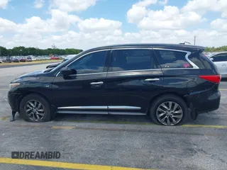 2015 Infiniti QX60 with VIN 5N1AL0MNXFC511350, listed as a IAAI auction lot 42117809 with 128,274 mi miles and . Bid and sale history available at DreamBid. Image 14.
