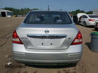 2007 Nissan Versa SL с VIN 3N1BC11E87L401537, выставлен на аукционе Copart как лот 60481435 с пробегом 383 005 миль миль и Списание • Salvage title. История ставок и продаж доступна на DreamBid. Изображение 6.