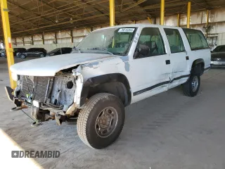 1993 Chevrolet Suburban z VIN 1GNGK26K8PJ352462, wystawiony jako Copart lot #76616364 z przebiegiem 147 505 mil mil oraz Czysty tytuł • Clean title. Historia ofert i sprzedaży dostępna na DreamBid. Obrazek 1.