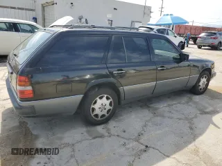1987 Mercedes-Benz 300 with VIN WDBEB93D1HF041635, listed as a Copart auction lot 53718845 with 285,625 mi miles and Clean Title. Bid and sale history available at DreamBid. Image 3.