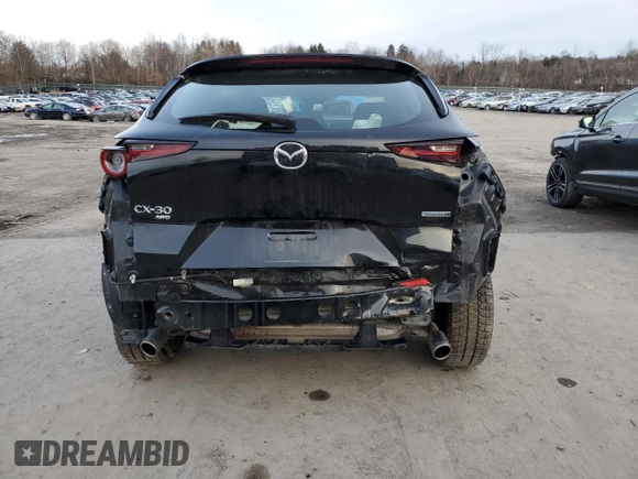 2020 Mazda CX-30 with VIN 3MVDMBBL8LM123778, listed as a Copart auction lot 45567034 with 27,452 mi miles and Salvage Title. Bid and sale history available at DreamBid. Image 6.
