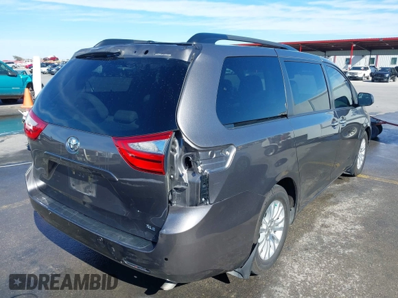 2016 Toyota Sienna XLE with VIN 5TDYK3DC7GS721667, listed as a IAAI auction lot 41400702 with 85,188 mi miles and . Bid and sale history available at DreamBid. Image 4.