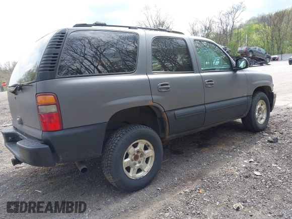 2003 Chevrolet Tahoe LS with VIN 1GNEK13Z13J287628, listed as a IAAI auction lot 42145379 with 141,957 mi miles and . Bid and sale history available at DreamBid. Image 4.