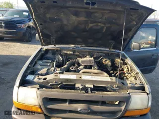 2000 Ford Ranger XL with VIN 1FTYR10C0YPA77074, listed as a IAAI auction lot 42023554 with 179,390 mi miles. Bid and sale history available at carsss.com. Image 10.