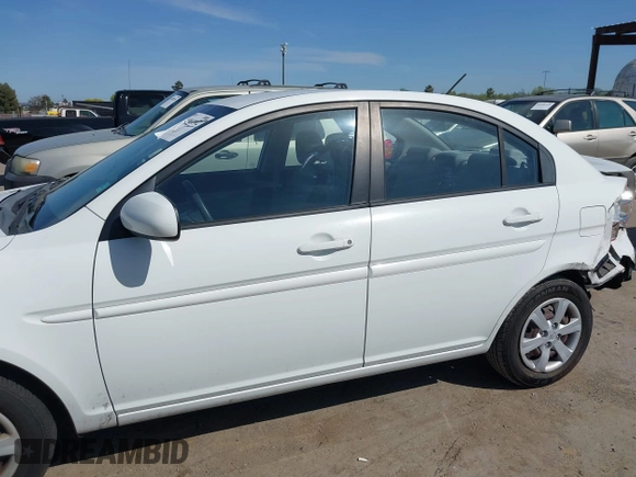 2010 Hyundai Accent GLS with VIN KMHCN4AC7AU473527, listed as a IAAI auction lot 41965592 with 104,506 mi miles. Bid and sale history available at carsss.com. Image 14.