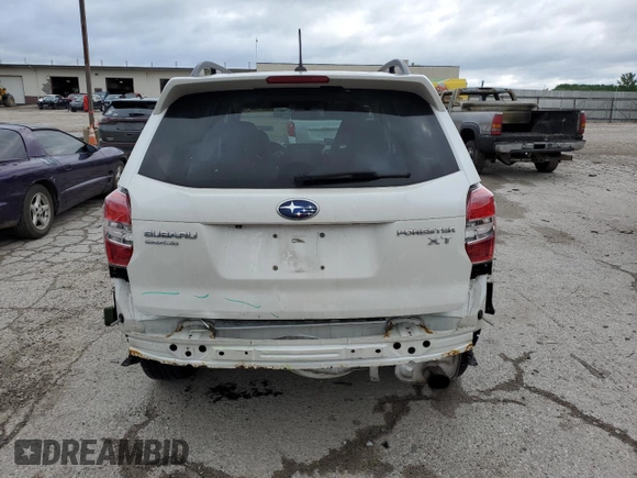 2015 Subaru Forester XT Touring with VIN JF2SJGUC5FH538188, listed as a Copart auction lot 57512555 with 94,236 mi miles and Salvage title. Bid and sale history available at DreamBid. Image 6.