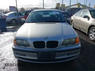 1999 BMW 3 Series 323i with VIN WBAAM3330XKC56332, listed as a IAAI auction lot 41200762 with 157,004 mi miles. Bid and sale history available at carsss.com. Image 12.
