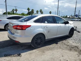 2016 Ford Focus SE z VIN 1FADP3F24GL309119, wystawiony jako Copart lot #62279095 z przebiegiem 117 535 mil mil oraz Szkoda całkowita • Salvage title. Historia ofert i sprzedaży dostępna na DreamBid. Obrazek 3.
