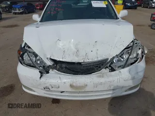 2003 Toyota Camry LE with VIN 4T1BE32K13U250477, listed as a IAAI auction lot 41996101 with 212,951 mi miles and . Bid and sale history available at DreamBid. Image 6.