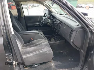 2004 Dodge Dakota SLT z VIN 1D7HG48N54S664848, wystawiony jako IAAI lot #42152635 z przebiegiem 153 824 mil mil oraz . Historia ofert i sprzedaży dostępna na DreamBid. Obrazek 5.