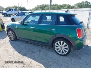 2020 MINI Hardtop 4 Door Cooper with VIN WMWXU7C06L2M63032, listed as a IAAI auction lot 42572567 with 86,220 mi miles and . Bid and sale history available at DreamBid. Image 3.