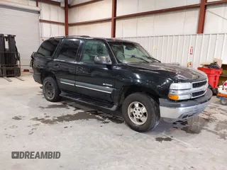 2003 Chevrolet Tahoe LT with VIN 1GNEC13Z43J340111, listed as a IAAI auction lot 41574135 with 251,307 mi miles. Bid and sale history available at carsss.com. Image 1.
