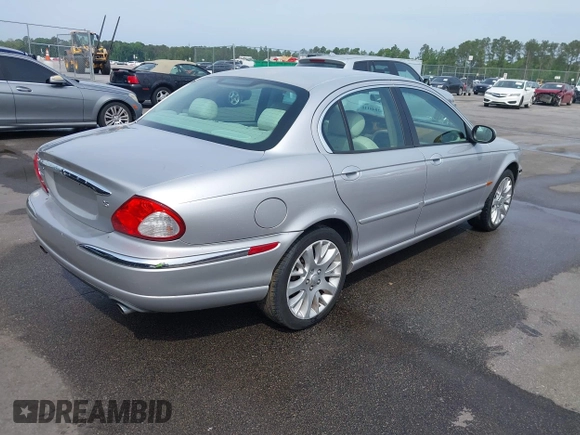 2003 Jaguar X-Type 2.5L Manual with VIN SAJEA51D33XC93300, listed as a IAAI auction lot 42048118 with 116,939 mi miles and . Bid and sale history available at DreamBid. Image 4.