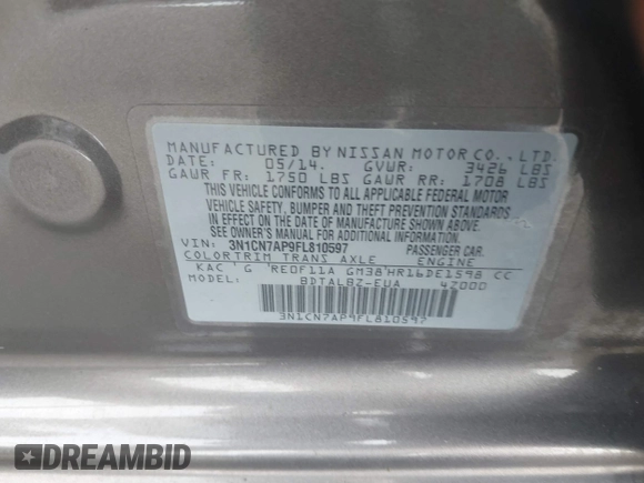 2015 Nissan Versa S Plus with VIN 3N1CN7AP9FL810597, listed as a IAAI auction lot 41681629 with 133,777 mi miles. Bid and sale history available at carsss.com. Image 9.