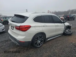 2016 BMW X1 xDrive28i with VIN WBXHT3C36GP881275, listed as a Copart auction lot 49181055 with 129,469 mi miles and Salvage Title. Bid and sale history available at carsss.com. Image 3.