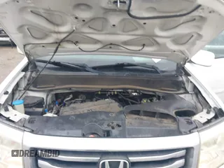 2013 Honda Pilot EX-L with VIN 5FNYF3H52DB014959, listed as a IAAI auction lot 41459164 with 174,136 mi miles and . Bid and sale history available at DreamBid. Image 10.