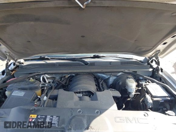 2015 GMC Yukon SLE with VIN 1GKS1AKC8FR540627, listed as a IAAI auction lot 42004023 with 128,195 mi miles. Bid and sale history available at carsss.com. Image 10.
