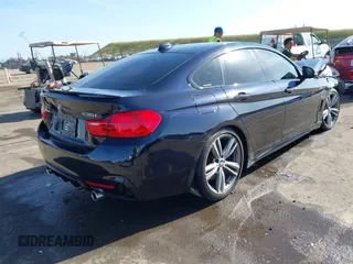 2015 BMW 4 Series 435i with VIN WBA4B1C54FD418309, listed as a IAAI auction lot 42099401 with 119,982 mi miles and . Bid and sale history available at carsss.com. Image 4.