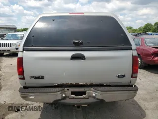 1999 Ford F-250 with VIN 1FTRX27LXXNC18863, listed as a Copart auction lot 63051395 with 118,695 mi miles and Clean title. Bid and sale history available at DreamBid. Image 6.