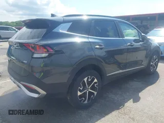 2023 Kia Sportage EX with VIN KNDPVCAG2P7046184, listed as a IAAI auction lot 42212231 with 25,212 mi miles and . Bid and sale history available at DreamBid. Image 4.