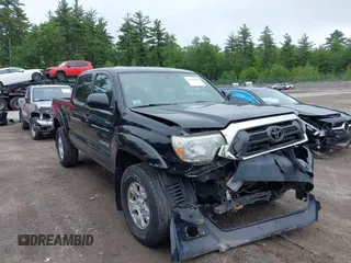 2015 Toyota Tacoma z VIN 3TMLU4EN2FM202275, wystawiony jako IAAI lot #42523799 z przebiegiem 76 170 mil mil oraz . Historia ofert i sprzedaży dostępna na DreamBid. Obrazek 1.