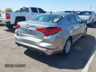 2013 Kia Optima LX with VIN KNAGM4A74D5423255, listed as a IAAI auction lot 42065230 with 116,589 mi miles. Bid and sale history available at carsss.com. Image 6.