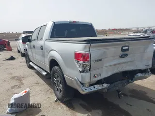 2013 Ford F-150 XL with VIN 1FTFW1CF6DKG22708, listed as a IAAI auction lot 41725908 with 155,530 mi miles and . Bid and sale history available at carsss.com. Image 3.