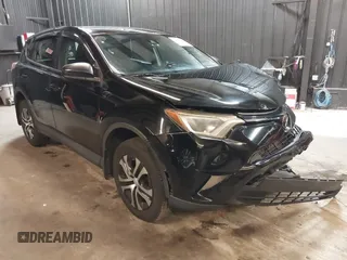 2018 Toyota RAV4 LE with VIN 2T3BFREV7JW768376, listed as a IAAI auction lot 41864571 with 292,147 mi miles. Bid and sale history available at carsss.com. Image 1.