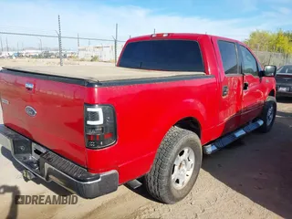 2005 Ford F-150 XLT with VIN 1FTPW12555KD00513, listed as a IAAI auction lot 41885017 with 217,032 mi miles. Bid and sale history available at carsss.com. Image 4.