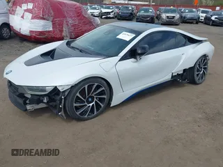 2016 BMW i8 with VIN WBY2Z2C53GV675600, listed as a IAAI auction lot 42079477 with 26,756 mi miles. Bid and sale history available at carsss.com. Image 2.