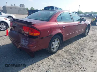 2002 Oldsmobile Alero GL1 z VIN 1G3NL52E02C215561, wystawiony jako IAAI lot #42230290 z przebiegiem 177 176 mil mil oraz . Historia ofert i sprzedaży dostępna na DreamBid. Obrazek 4.