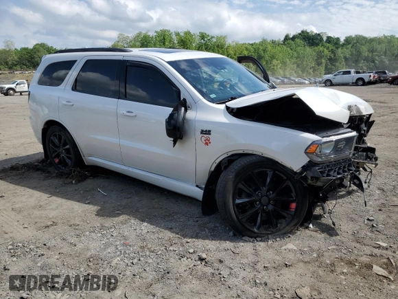 2017 Dodge Durango R/T with VIN 1C4SDJCTXHC606540, listed as a Copart auction lot 57125365 with 141,591 mi miles and Salvage title. Bid and sale history available at DreamBid. Image 4.