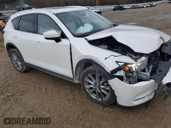 2021 Mazda CX-5 Grand Touring with VIN JM3KFADM9M0418578, listed as a Copart auction lot 85288084 with 37,861 mi miles and Salvage Title. Bid and sale history available at carsss.com. Image 4.