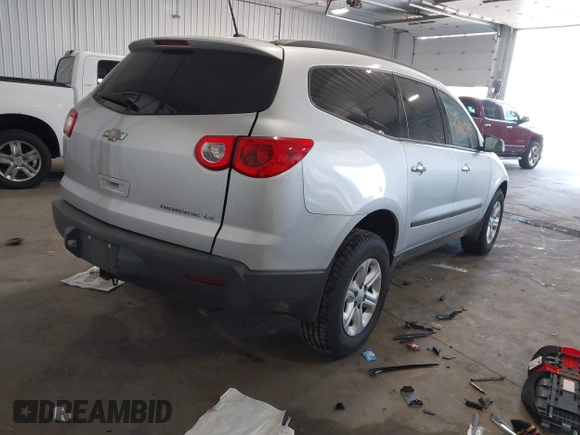 2012 Chevrolet Traverse LS z VIN 1GNKREED9CJ355181, wystawiony jako IAAI lot #42190745 z przebiegiem 94 177 mil mil oraz . Historia ofert i sprzedaży dostępna na DreamBid. Obrazek 4.