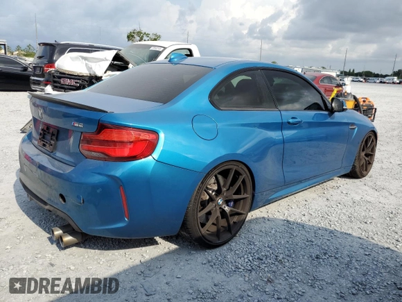 2018 BMW M2 z VIN WBS1J5C53JVD36649, wystawiony jako Copart lot #57961455 z przebiegiem 55 751 mil mil oraz Szkoda całkowita • Salvage title. Historia ofert i sprzedaży dostępna na DreamBid. Obrazek 3.