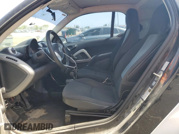 2014 Smart fortwo Pure with VIN WMEEJ3BAXEK778748, listed as a Copart auction lot 57611955 with 59,895 mi miles and Clean title. Bid and sale history available at DreamBid. Image 7.