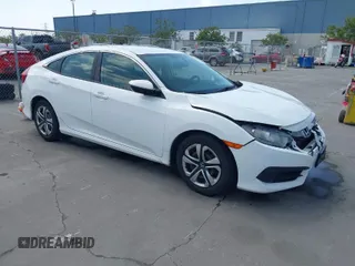 2016 Honda Civic Sedan LX with VIN 19XFC2F54GE215012, listed as a IAAI auction lot 42046334 with 146,348 mi miles. Bid and sale history available at carsss.com. Image 1.