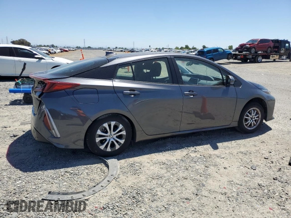 2021 Toyota Prius LE z VIN JTDKAMFPXM3190346, wystawiony jako Copart lot #57626675 z przebiegiem 102 786 mil mil oraz Szkoda całkowita • Salvage title. Historia ofert i sprzedaży dostępna na DreamBid. Obrazek 3.