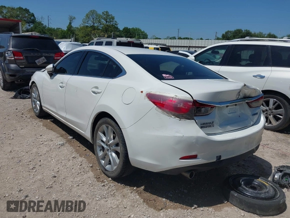 2015 Mazda 6 i Touring with VIN JM1GJ1V55F1209341, listed as a IAAI auction lot 41984500 with 192,140 mi miles. Bid and sale history available at carsss.com. Image 3.