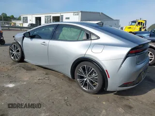 2024 Toyota Prius LE with VIN JTDACAAU2R3020491, listed as a IAAI auction lot 42004580 with 22,812 mi miles and . Bid and sale history available at DreamBid. Image 3.
