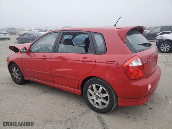 2005 Kia Spectra with VIN KNAFE161555106792, listed as a Copart auction lot 82832374 with 101,747 mi miles and Salvage Title. Bid and sale history available at carsss.com. Image 2.