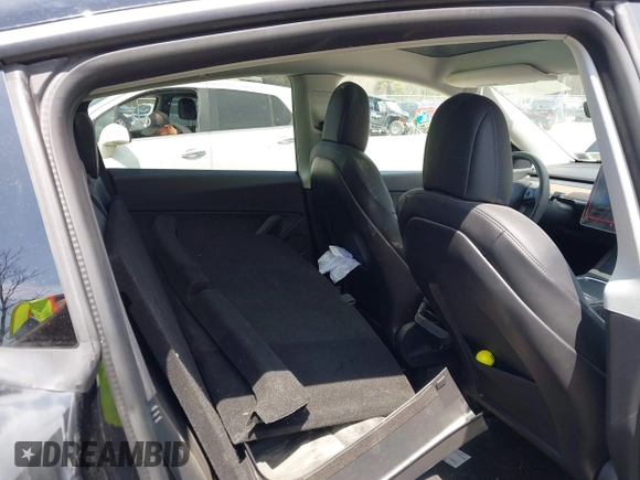 2022 Tesla Model Y Performance with VIN 7SAYGDEF7NF310113, listed as a IAAI auction lot 42038407 with 46,052 mi miles and . Bid and sale history available at DreamBid. Image 8.
