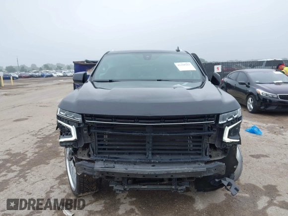 2021 Chevrolet Tahoe LT with VIN 1GNSCNKDXMR172381, listed as a IAAI auction lot 42168263 with 89,112 mi miles and . Bid and sale history available at DreamBid. Image 13.